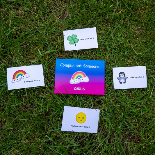 Set of cute compliment cards on grass