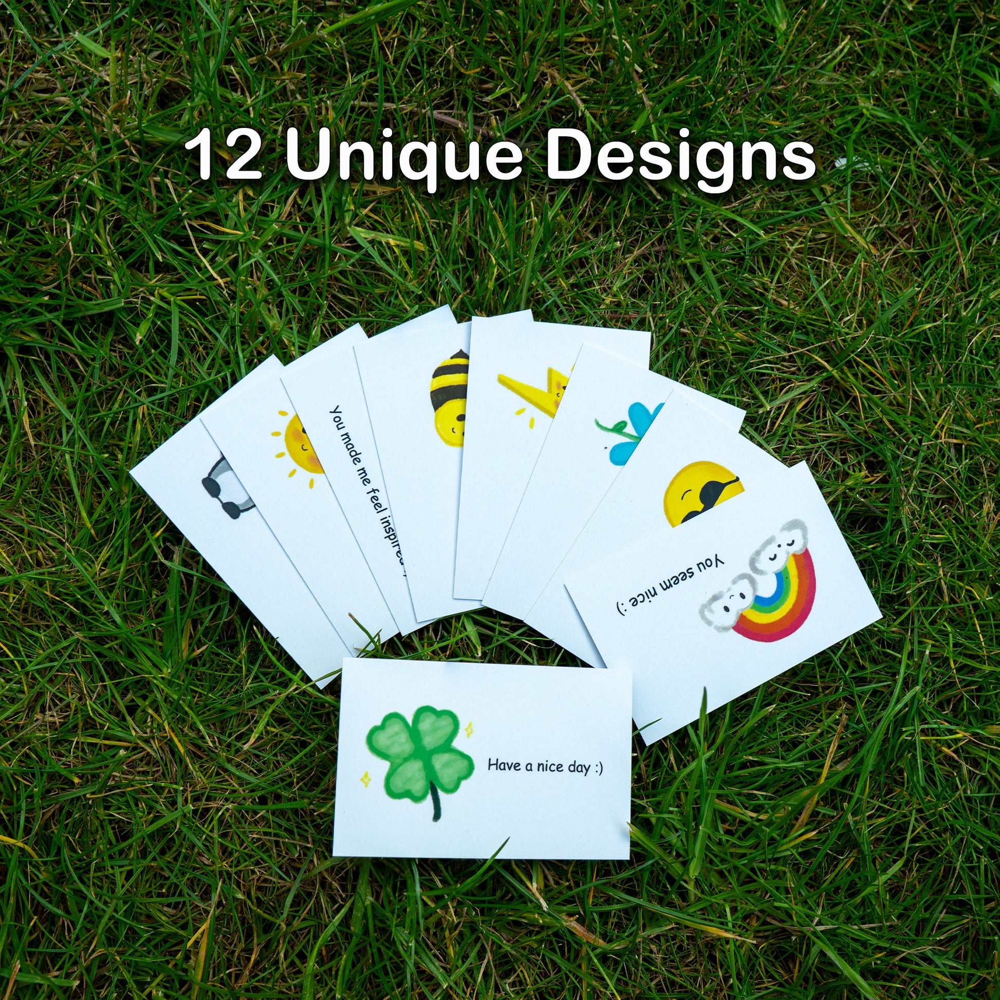 Casual compliment cards spread on the grass
